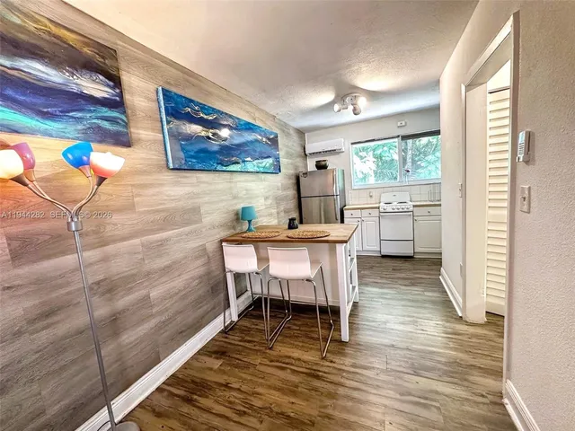 wooden floor with sitting area