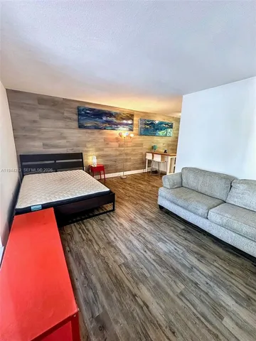 a view of dining room and wooden floor