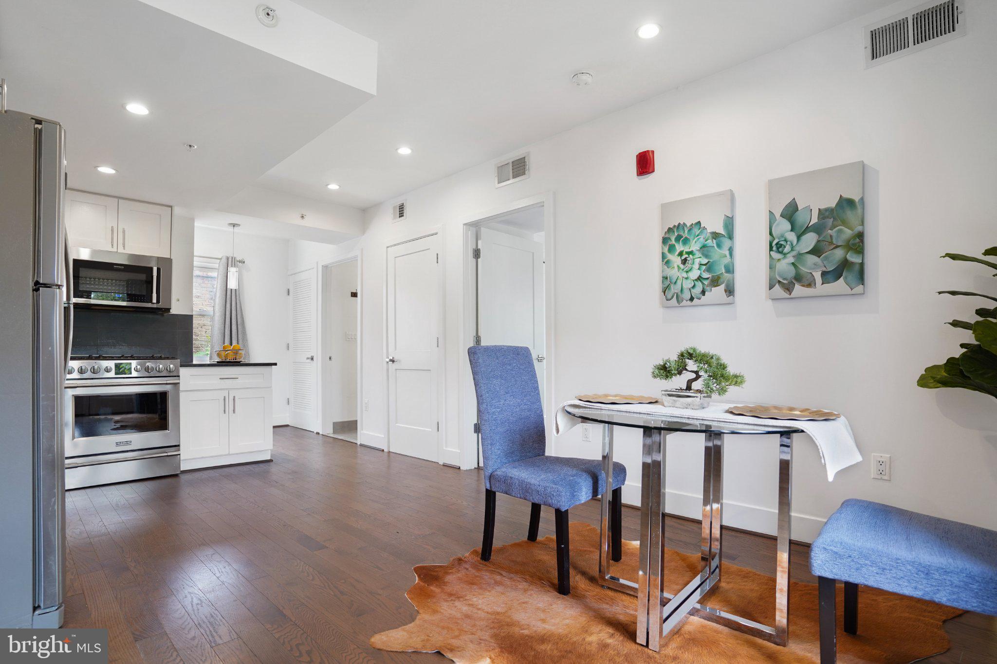 7723 Alaska Avenue Northwest, Unit 103 Washington, DC 20012 - Photo 7 of 12 Modern kitchen with stylish accents.