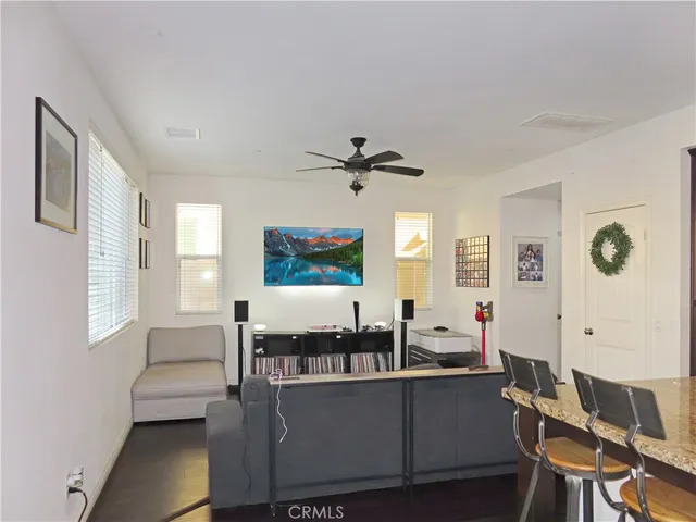 a living room with furniture and window