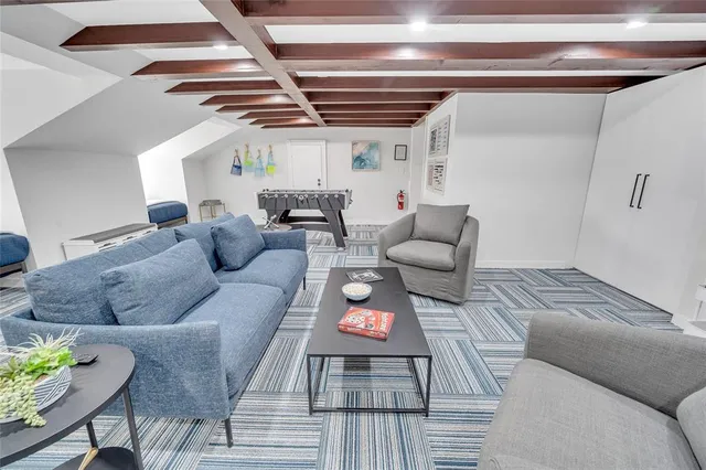 a living room with furniture and a couch