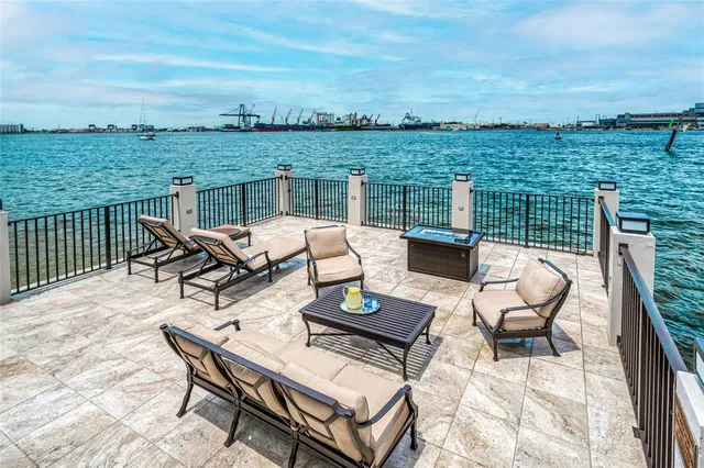 a view of a patio with swimming pool