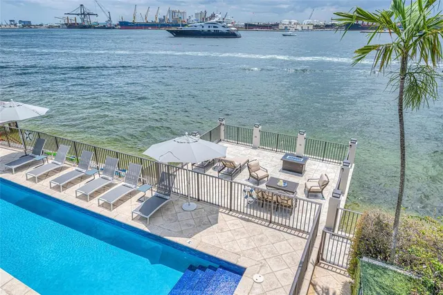 a view of an outdoor sitting area with furniture