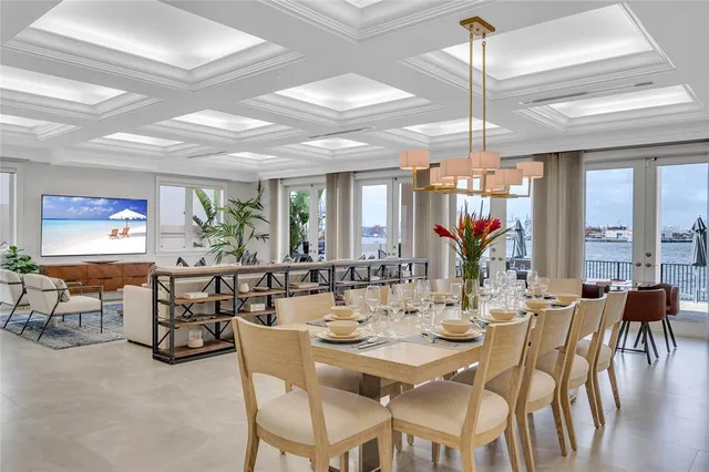 a view of a dining room with furniture window and outside view