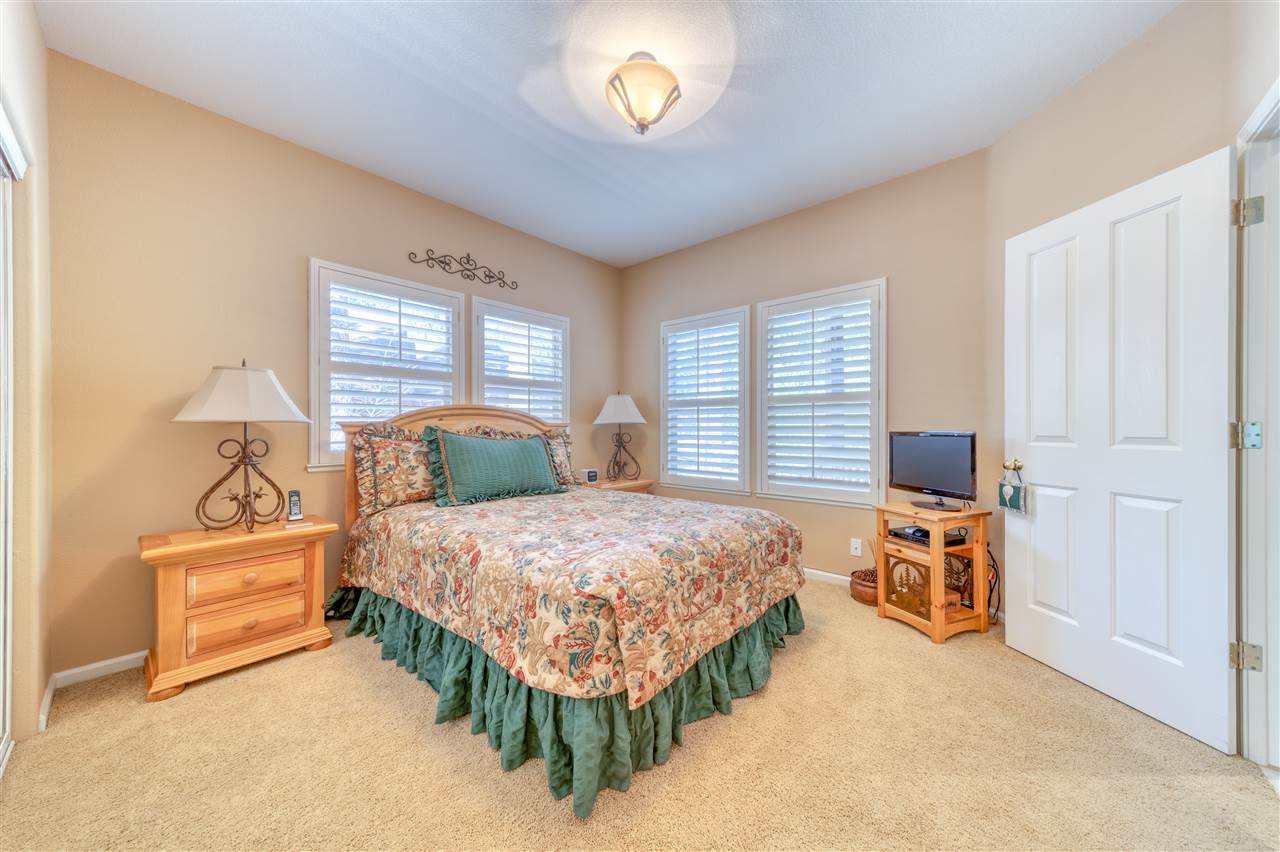 93 Bridle Path Clio, CA 96106 - Photo 12 of 21 a bedroom with a bed and a lamp on dresser