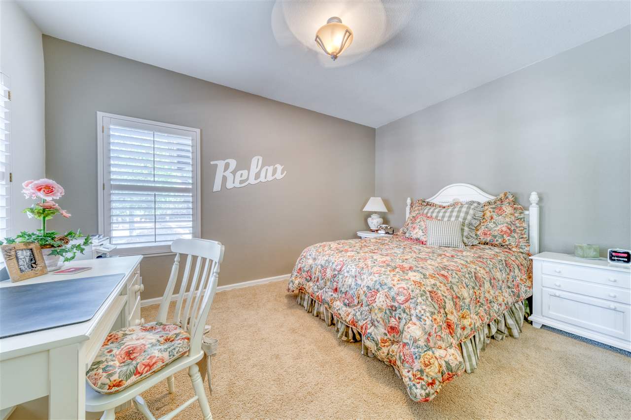 93 Bridle Path Clio, CA 96106 - Photo 14 of 21 a bedroom with a bed and a table