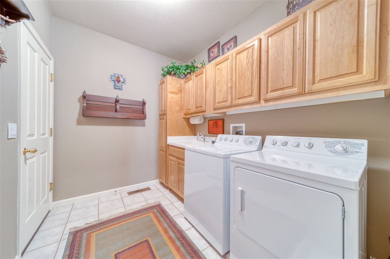 93 Bridle Path Clio, CA 96106 - Photo 16 of 21 a utility room with dryer and washer