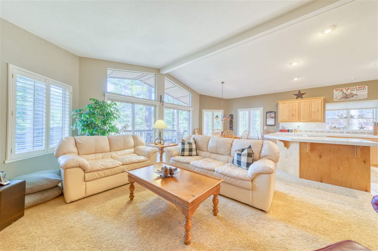 93 Bridle Path Clio, CA 96106 - Photo 6 of 21 a living room with furniture and a large window