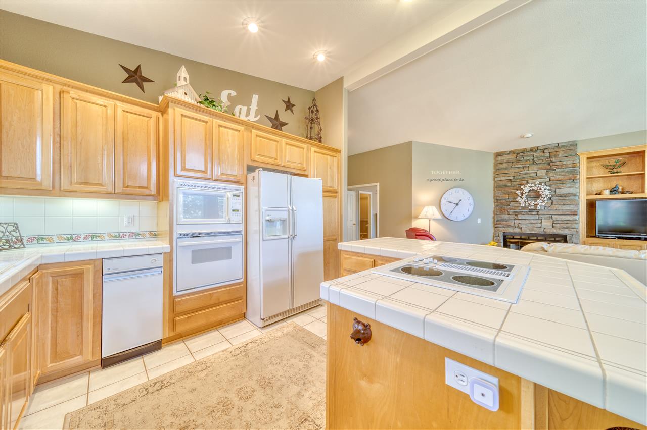 93 Bridle Path Clio, CA 96106 - Photo 7 of 21 a kitchen that has a stove a sink and a refrigerator