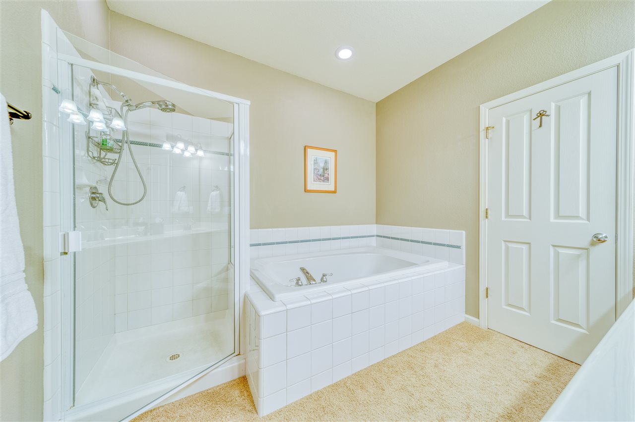 93 Bridle Path Clio, CA 96106 - Photo 10 of 21 a bathroom with a tub shower and a sink