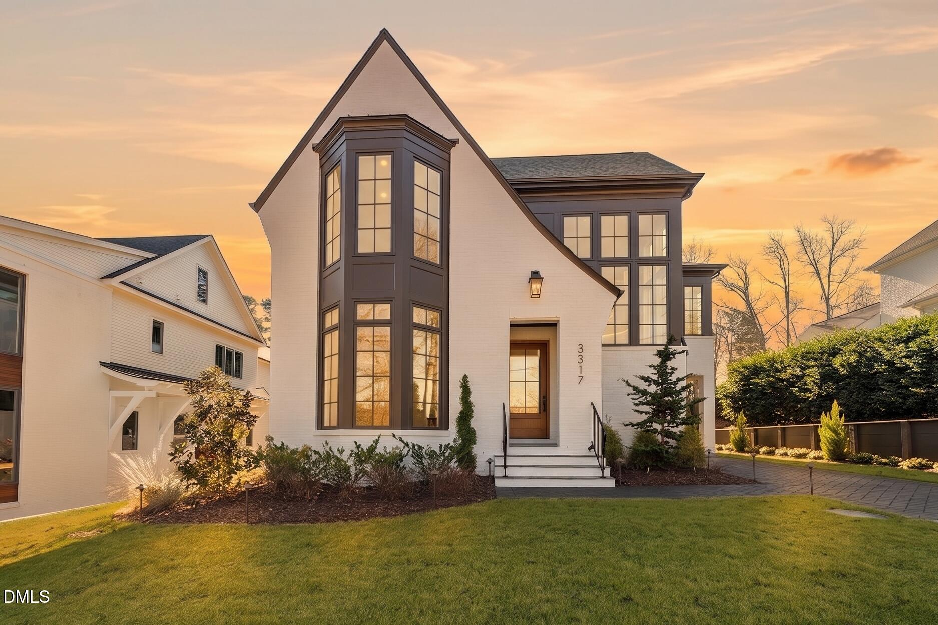 3317 Hampton Road Raleigh, NC 27607 - Photo 1 of 45 a front view of a house with a yard