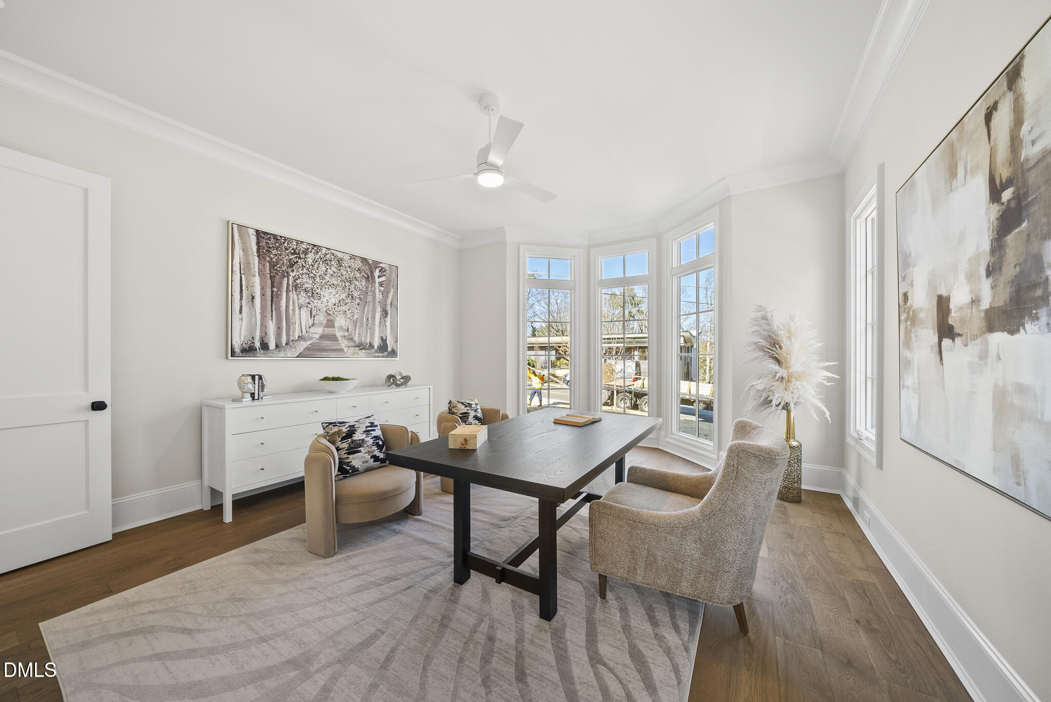 3317 Hampton Road Raleigh, NC 27607 - Photo 20 of 45 a living room with furniture a wooden floor and next to a window