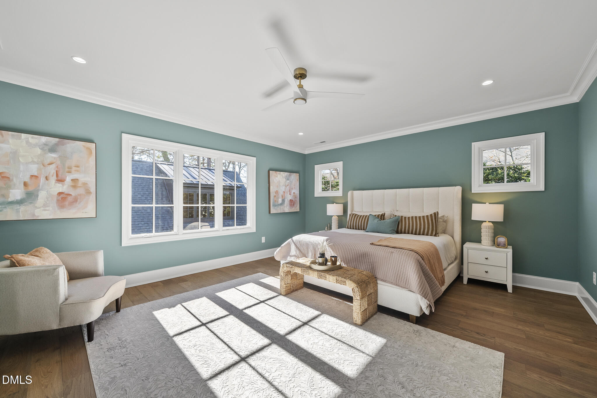 3317 Hampton Road Raleigh, NC 27607 - Photo 24 of 45 a spacious bedroom with a bed and wooden floor