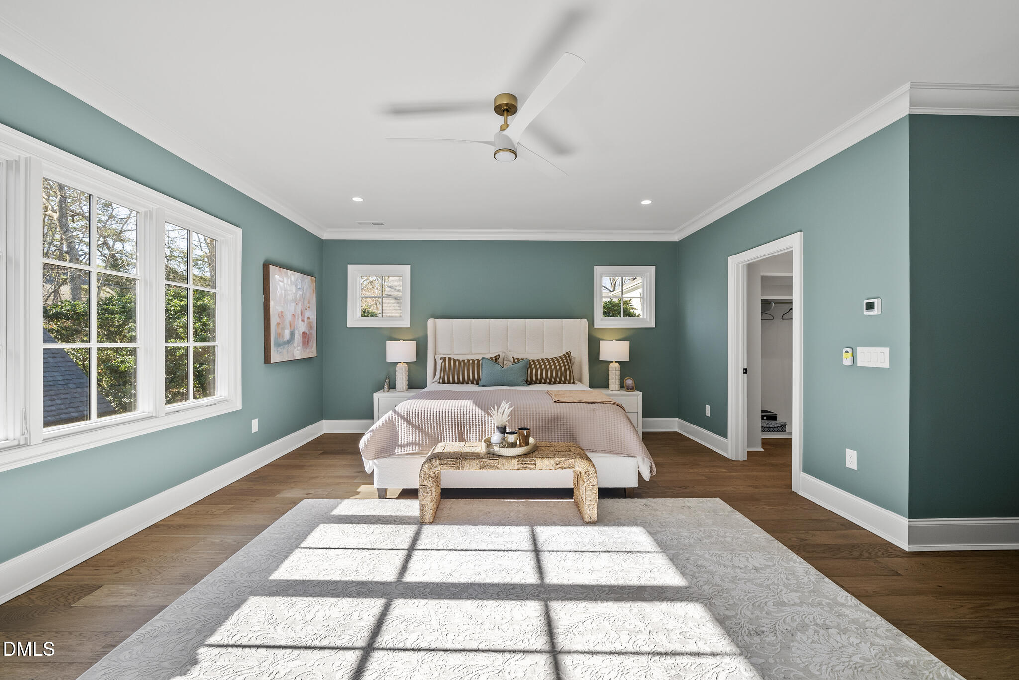 3317 Hampton Road Raleigh, NC 27607 - Photo 25 of 45 a bedroom with a large bed and a large window