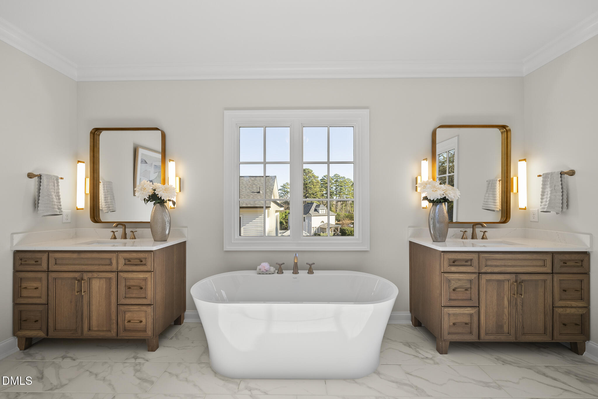 3317 Hampton Road Raleigh, NC 27607 - Photo 26 of 45 a spacious bathroom with a double vanity sink large mirror a bathtub and next to a window