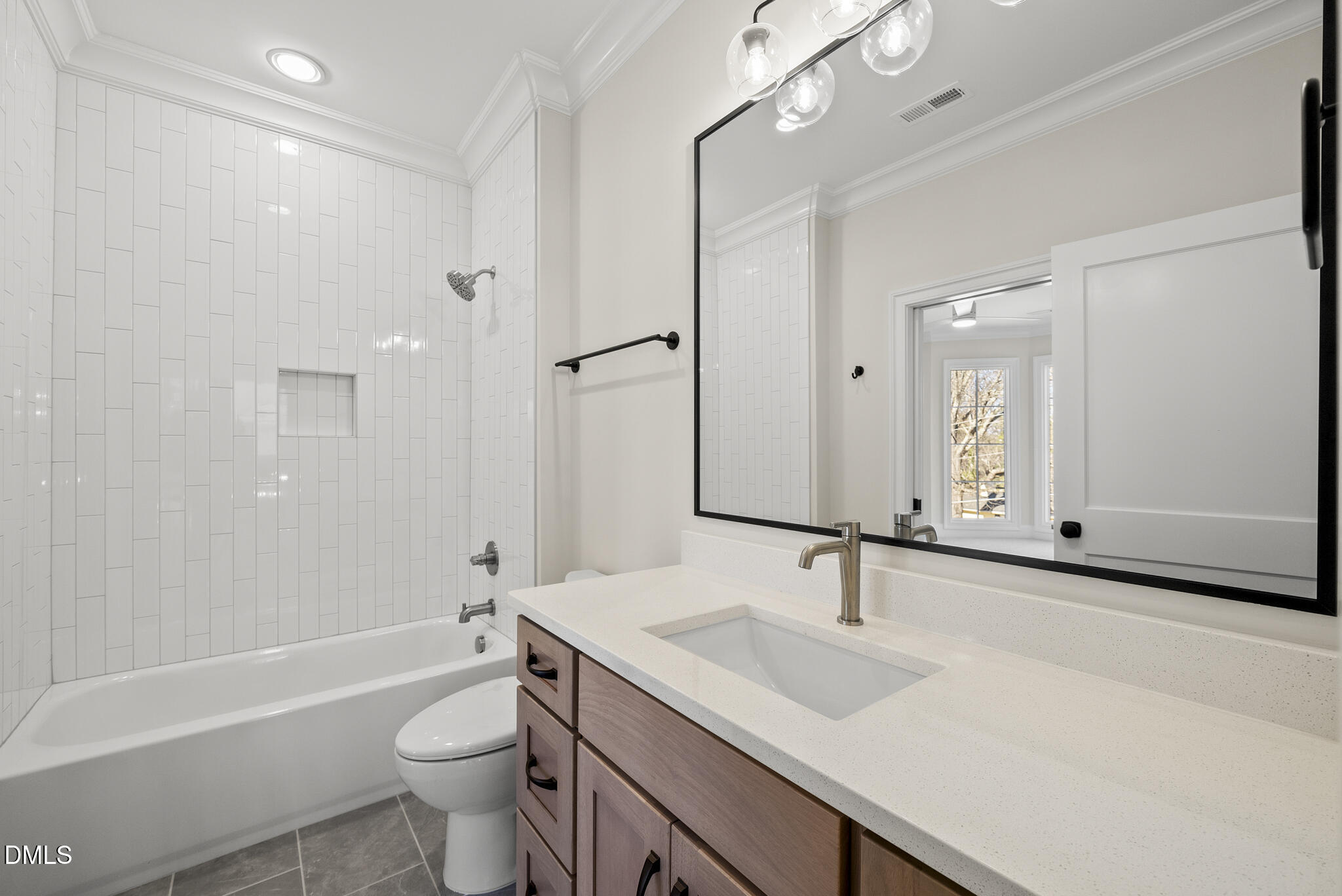 3317 Hampton Road Raleigh, NC 27607 - Photo 31 of 45 a bathroom with a sink double vanity granite toilet tub and shower