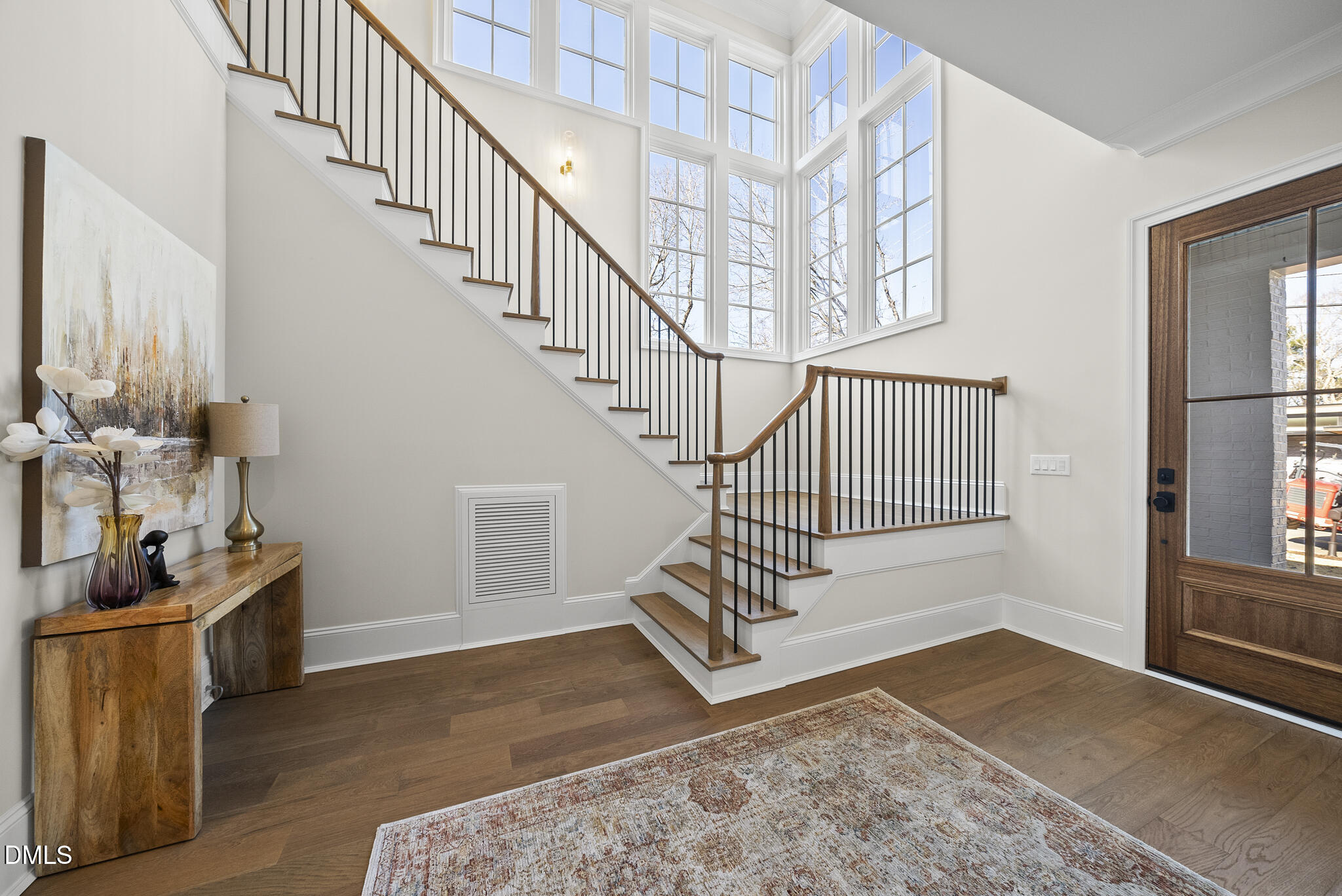 3317 Hampton Road Raleigh, NC 27607 - Photo 6 of 45 a view of entryway and hall with wooden floor