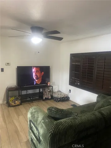 a kitchen with stainless steel appliances granite countertop a refrigerator and a stove