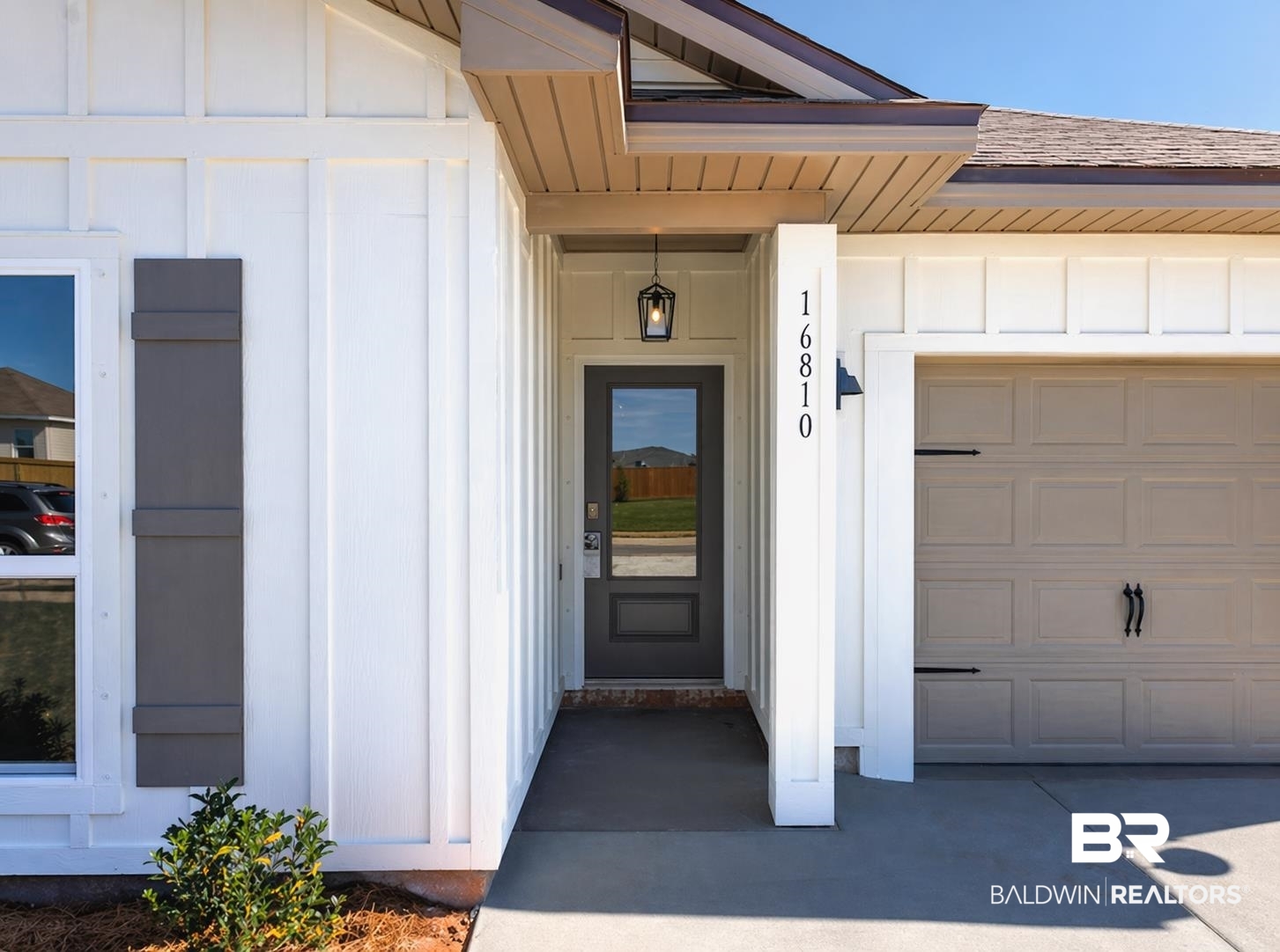 16810 Rocher Court Foley, AL 36535 - Photo 4 of 24 Contemporary exterior featuring white board and batten siding