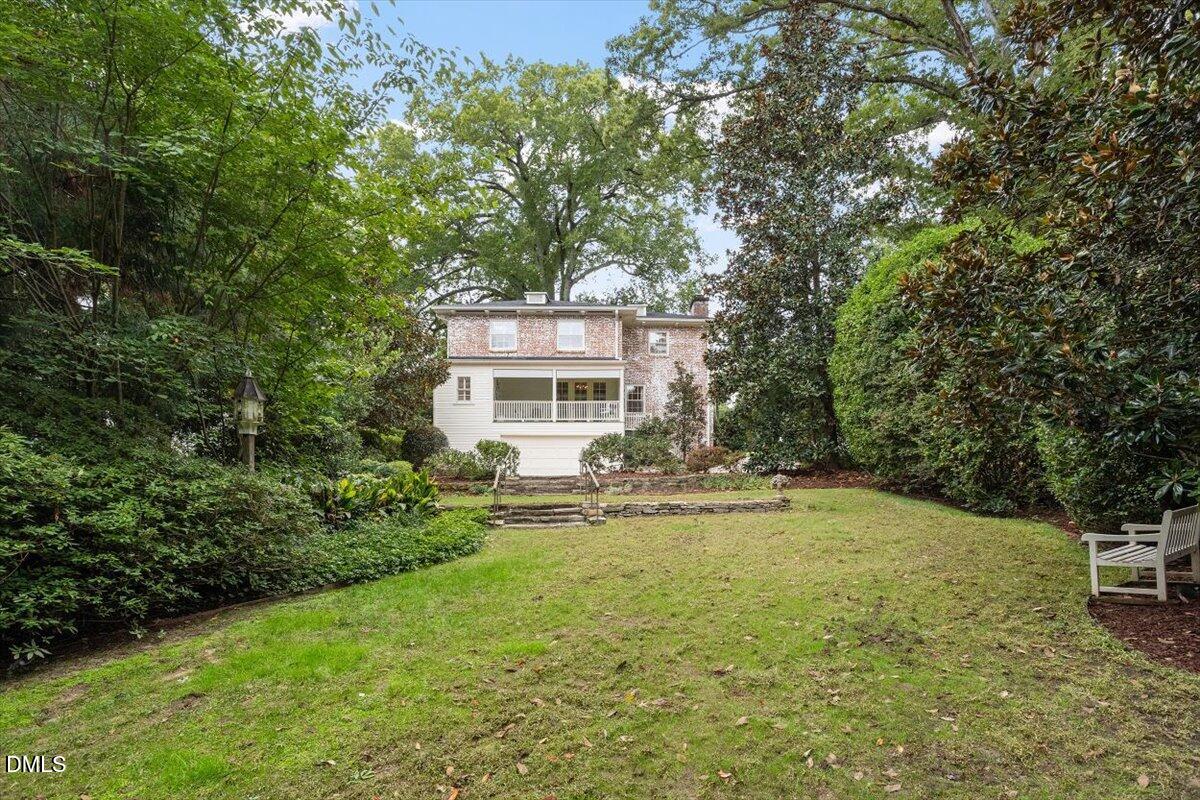 1128 Harvey Street Raleigh, NC 27608 - Photo 40 of 41 a view of a house with a yard