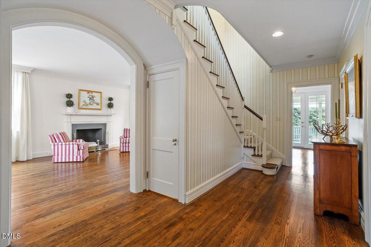 1128 Harvey Street Raleigh, NC 27608 - Photo 5 of 41 a view of a livingroom with wooden floor and furniture