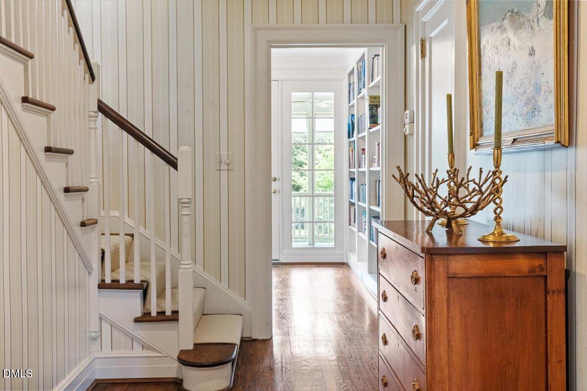 1128 Harvey Street Raleigh, NC 27608 - Photo 6 of 41 a view of entryway with wooden floor
