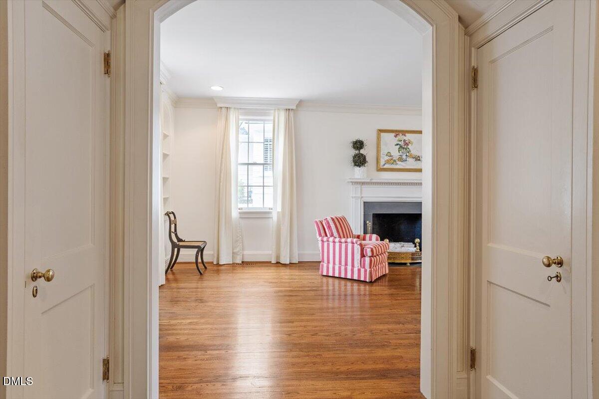 1128 Harvey Street Raleigh, NC 27608 - Photo 9 of 41 a living room with furniture and a fireplace
