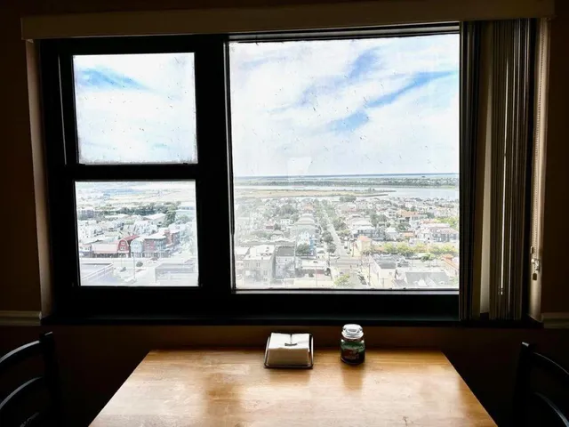 a picture of a room with a large window