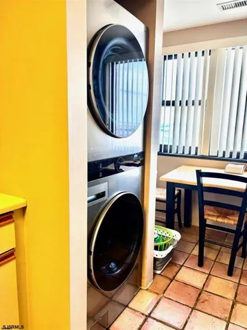 a close view of a utility room with washer and dryer