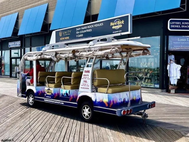 a view of outdoor sitting area with furniture and wooden deck