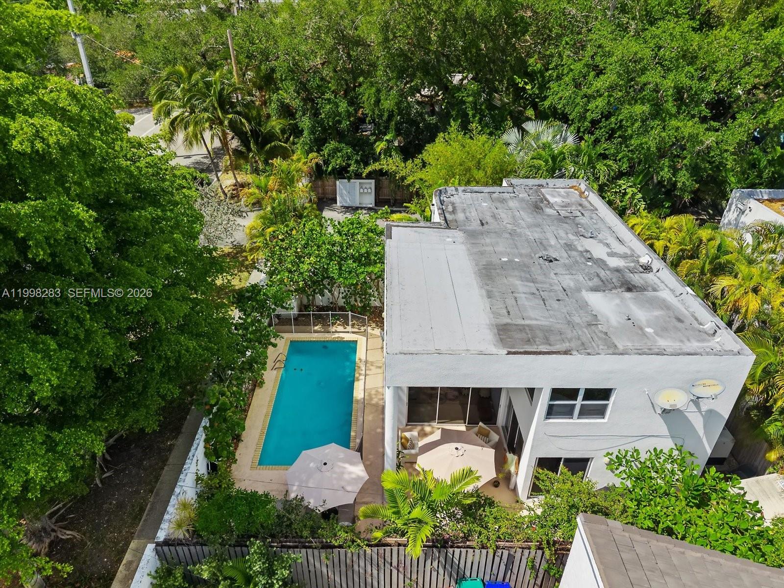 2721 Southwest 22nd Avenue, Unit A Miami, FL 33133 - Photo 35 of 36 an aerial view of a house with garden space and street view