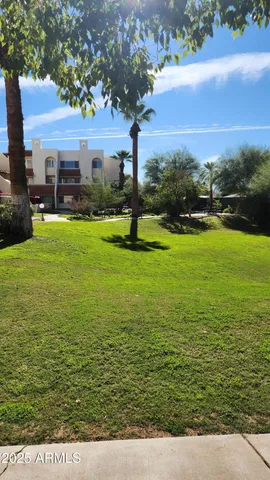 a view of a lake with a big yard