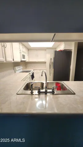 a view of kitchen and window