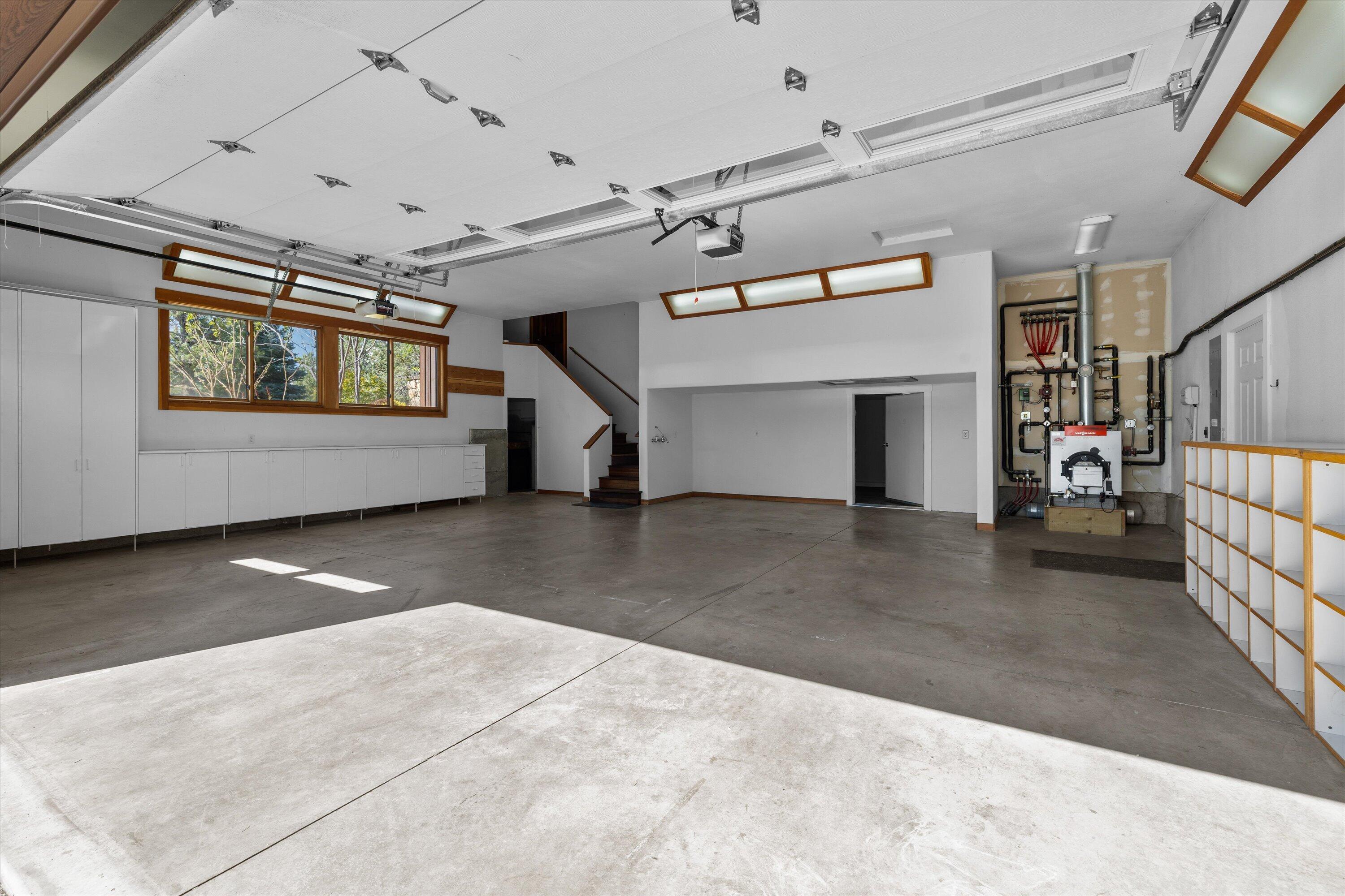 64155 Hunnell Road Bend, OR 97703 - Photo 55 of 96 Garage with in-floor heat and Tesla charger.