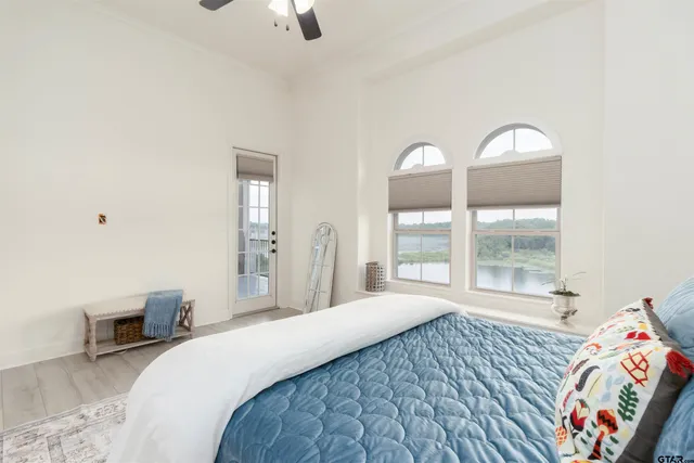 a view of a livingroom with furniture and a potted plant