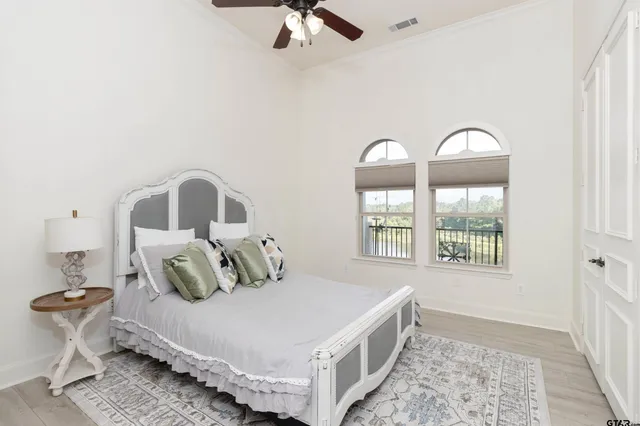 a view of a lake with houses in the back