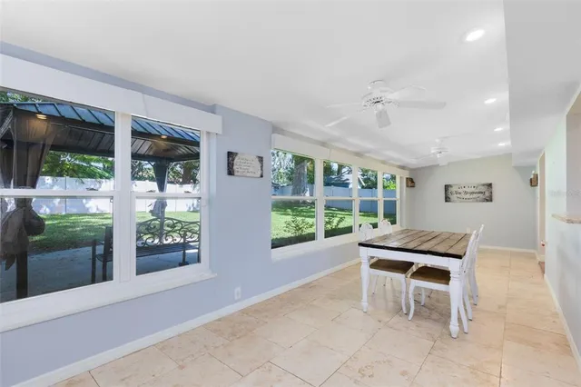 a room with furniture and a window