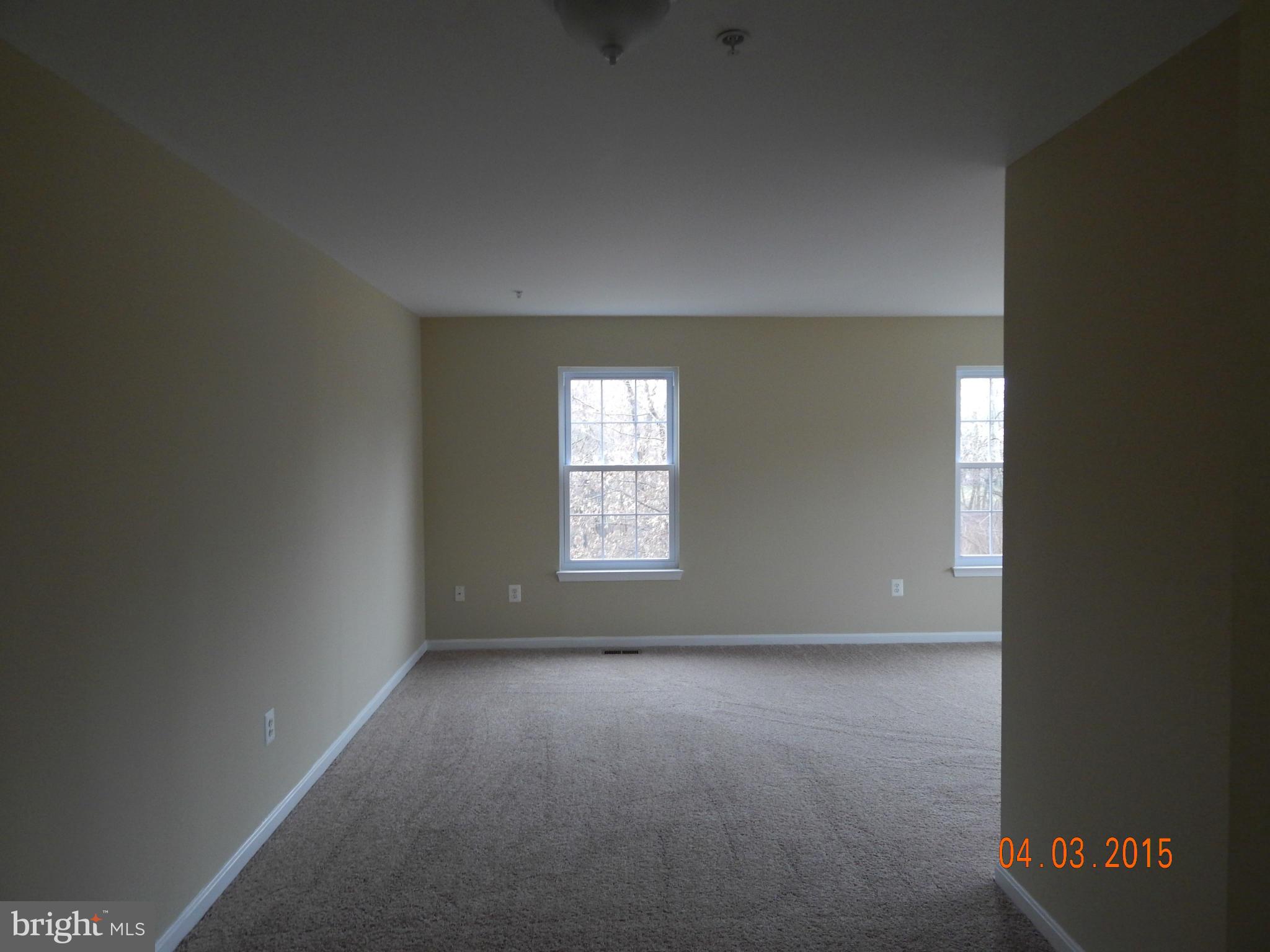 6539 Ridgeborne Drive Baltimore, MD 21237 - Photo 4 of 10 L-Shape Dining Room-Living Room