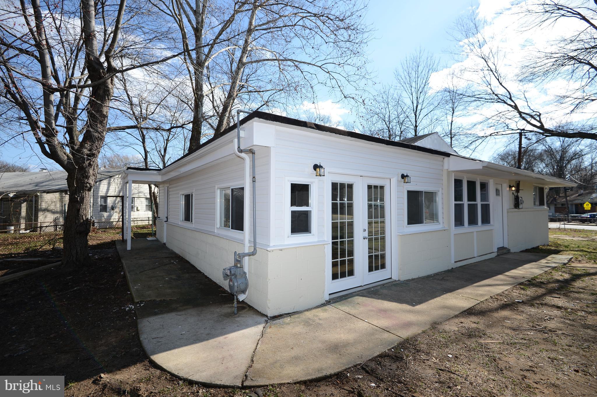 7500 Greenleaf Road Landover, MD 20785 - Photo 22 of 22 a front view of a house with a yard