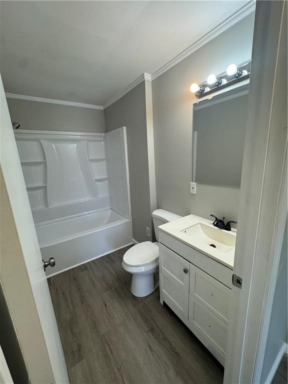 42 Busha Street Toccoa, GA 30577 - Photo 8 of 12 a bathroom with a toilet sink and mirror