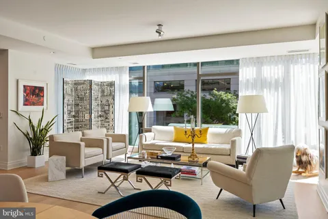 a dining room with a table chairs and a dining table