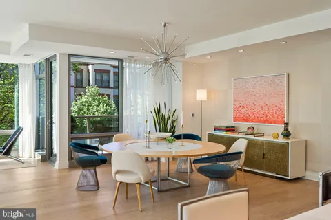 a kitchen with stainless steel appliances granite countertop a sink stove and microwave