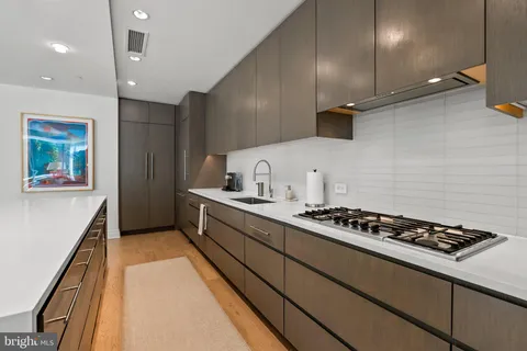 a view of a chair and fire pit in a porch