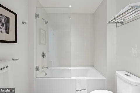 a room with gym equipment and a large window