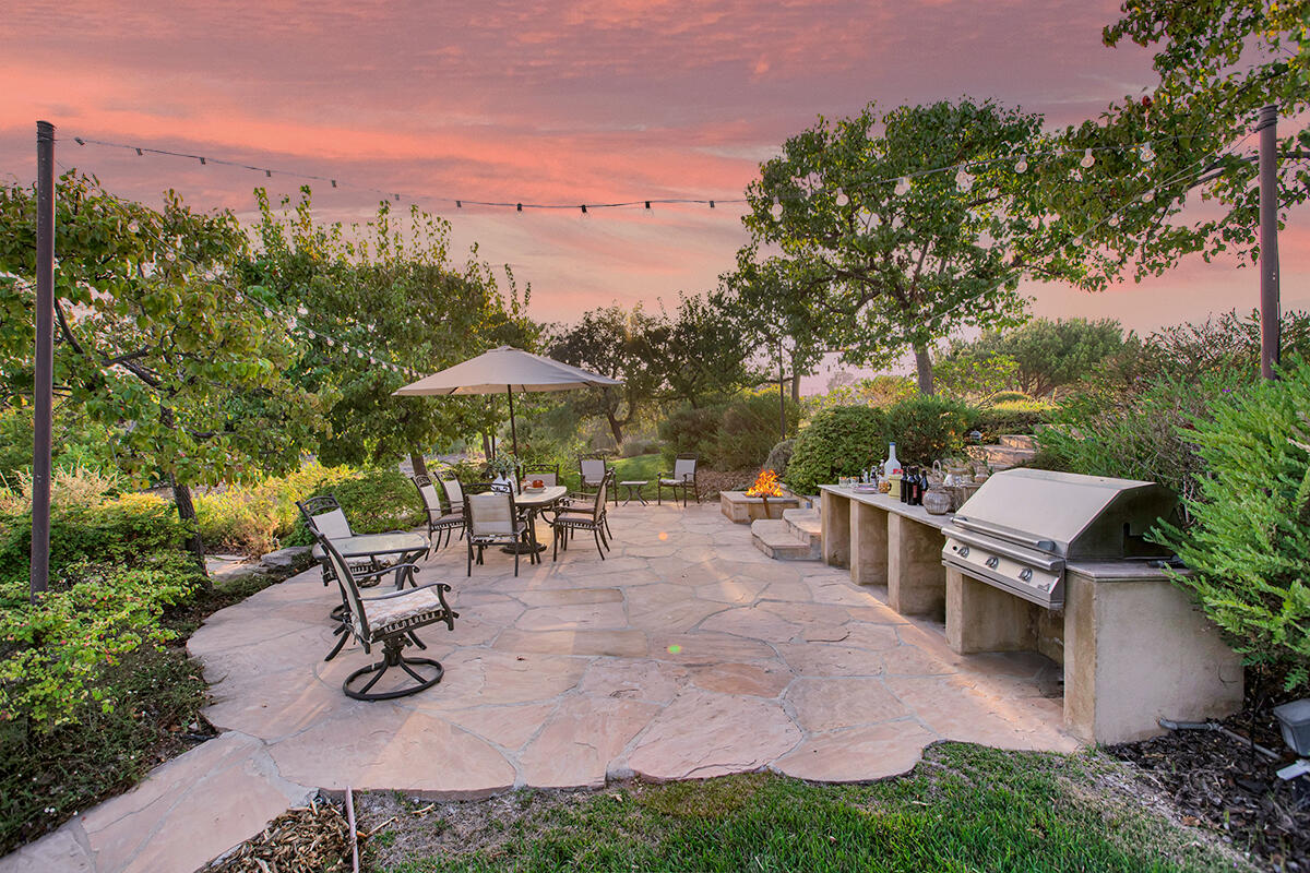 1121 Via Del Rey Santa Barbara, CA 93111 - Photo 54 of 66 Twilight Lower Patio Setting