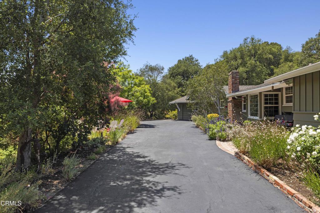 0 Stokes Canyon Road Calabasas, CA 91302 - Photo 18 of 52 a view of a house with a yard and garden