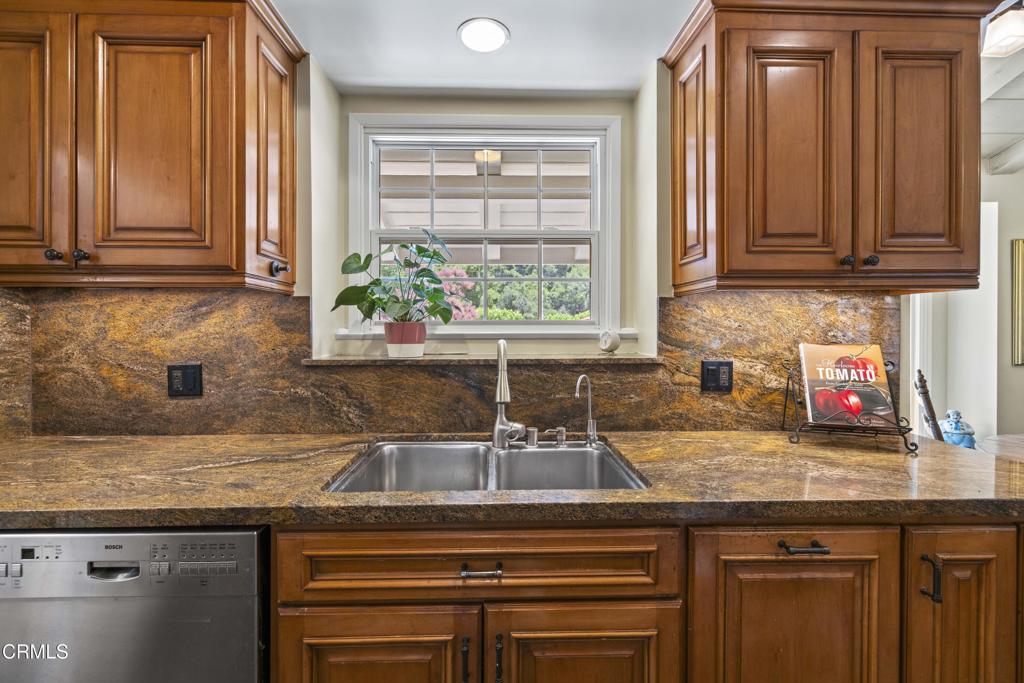 0 Stokes Canyon Road Calabasas, CA 91302 - Photo 20 of 52 a kitchen with granite countertop stainless steel appliances a sink window and cabinets
