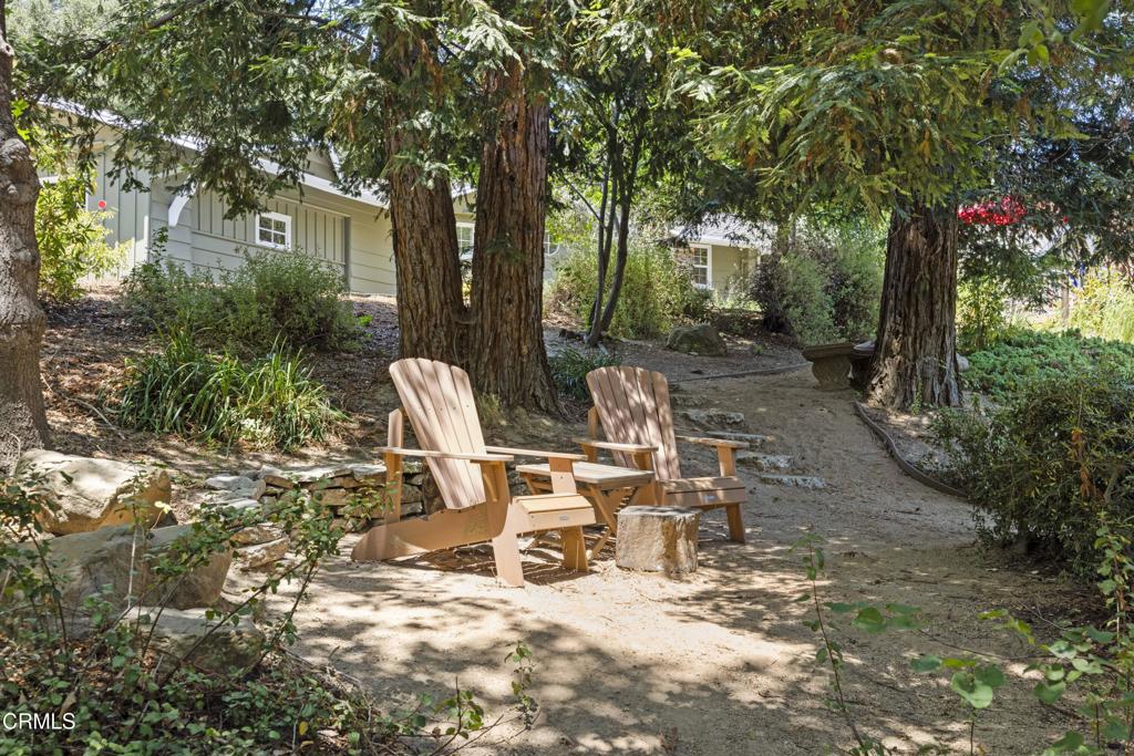 0 Stokes Canyon Road Calabasas, CA 91302 - Photo 47 of 52 a view of a chairs and table in backyard