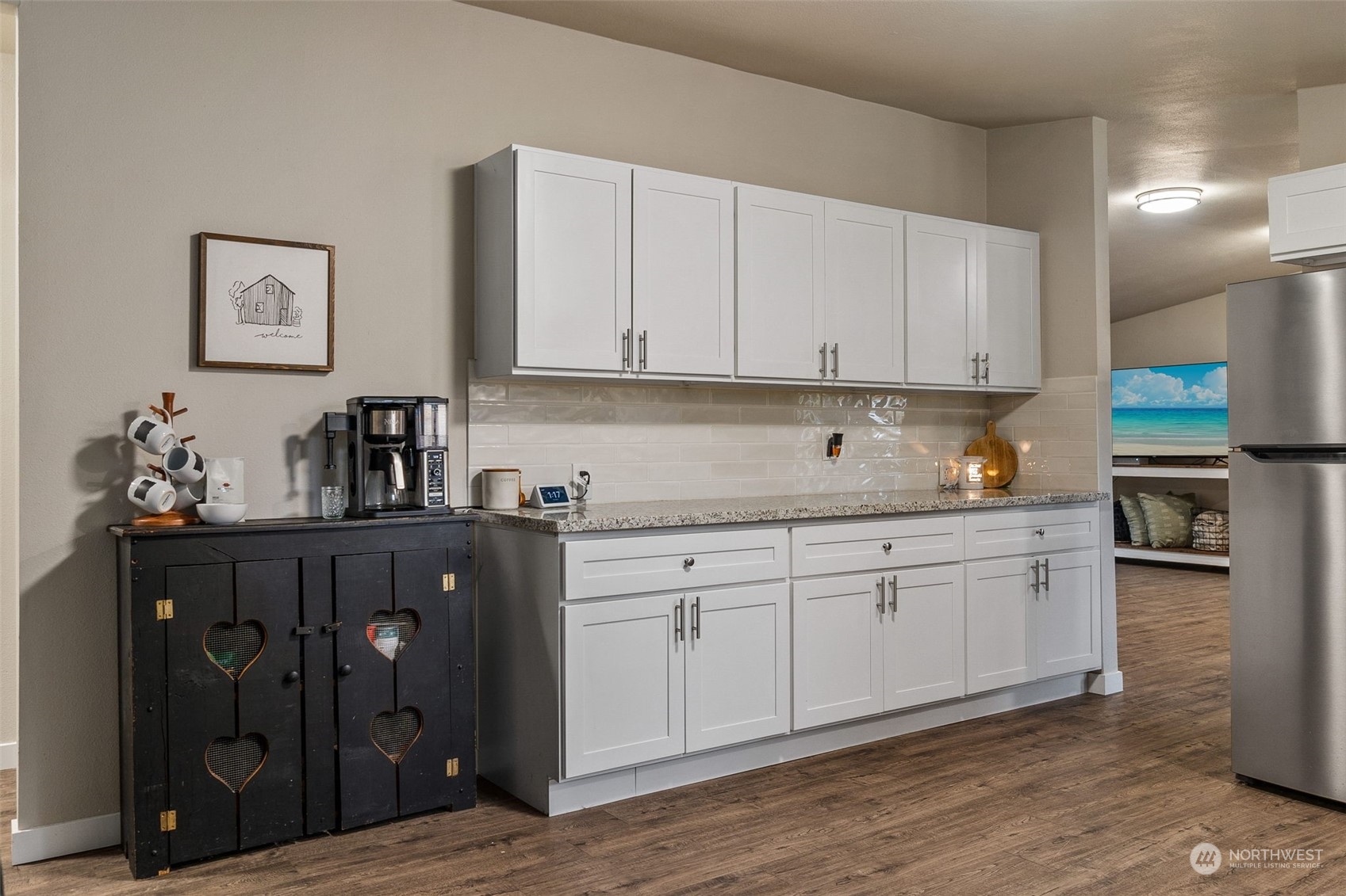 19025 Marble Street Southwest Rochester, WA 98579 - Photo 18 of 26 a kitchen with stainless steel appliances granite countertop a refrigerator and cabinets