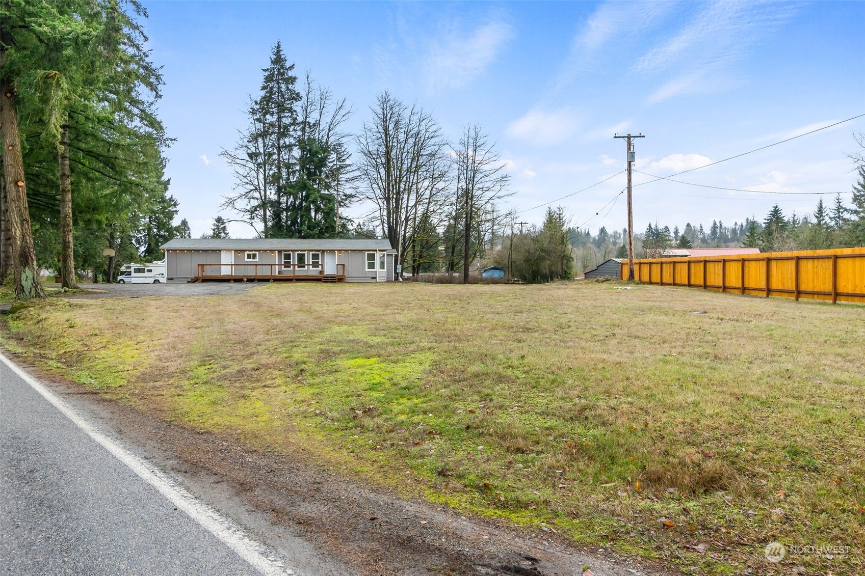 19025 Marble Street Southwest Rochester, WA 98579 - Photo 2 of 26 a view of a swimming pool with an ocean view